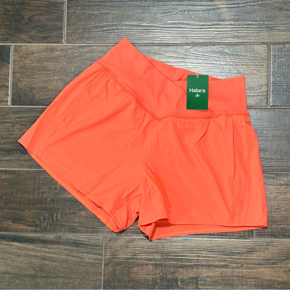 Brand new Halara cross front orange shorts